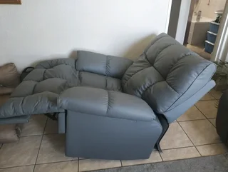 Grey Recliner sofa chair with rocking feature
