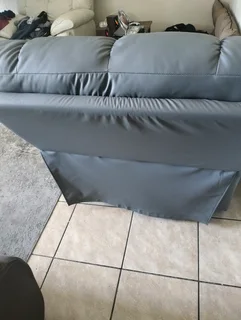 Grey Recliner sofa chair with rocking feature