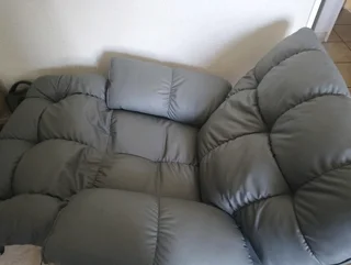 Grey Recliner sofa chair with rocking feature