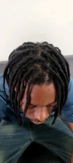 Dreadlocks stylist