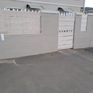 Nutec planks cladded on steel gates and boundary fence