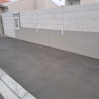 Nutec planks cladded on steel gates and boundary fence