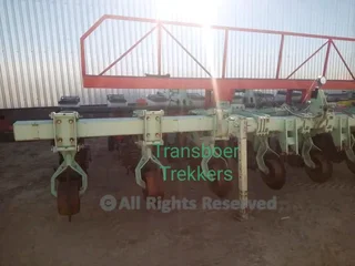 Prys verlaag !!Orthman 8 ry 91 Striptil met Massey Ferguson 555 planter op