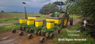 4 ry 91 John Deere 1750 vingerplanterOp John Deere 7000 raam