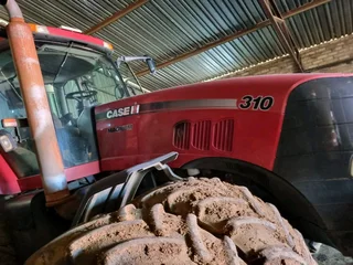 Case 310Jaar model 2009Met AutosteerUre 7200