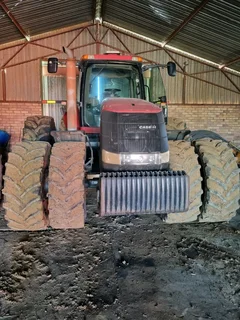 Case 310Jaar model 2009Met AutosteerUre 7200