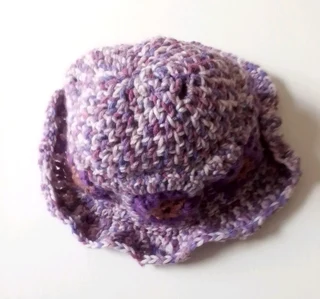 A daisy granny square bucket hat