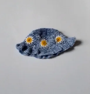 A purple daisy bucket hat