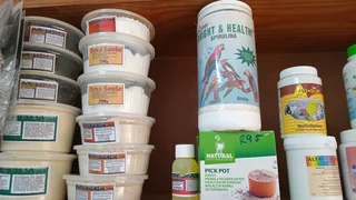 Red palm fruit oil with CBD for birds