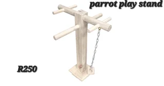 Parrot play stand mounted on top of the cage