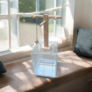 Parrot play stand mounted on top of the cage