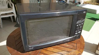 LG microwave and grill or combo (model MG 583 MC)