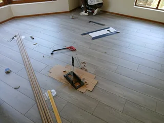 LAMINATE AND VINYL FLOORING SUPPLIED AND INSTALLED