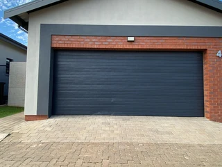 Garage door repair gate motor roll up garage door