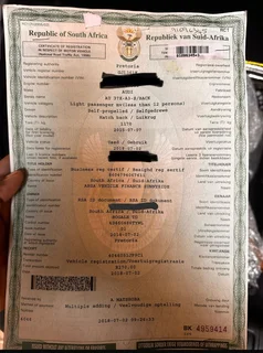 2015 Audi A3 Sportsback registration papers with VIN tags.