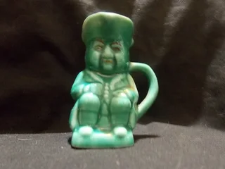 Green Lucia Ware Character Jug