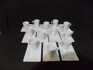 Set of Twelve Starter Plates with Sauce Cups