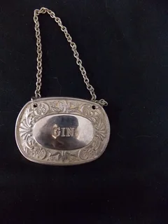 Set of Three Silver Plated Spirits Bottles Tags