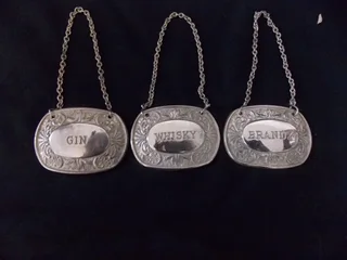 Set of Three Silver Plated Spirits Bottles Tags