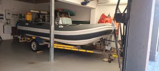 A 4.8m semi rigid inflatable boat with GRP hull pontoons. Pontoons are brand new. Boat has 2 x 240 h