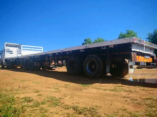 ​ 2000 Henred Flat Deck Superlink Link Trailer (6m / 12m) | R245,000 NO VAT​Price: R245k (NO VAT)