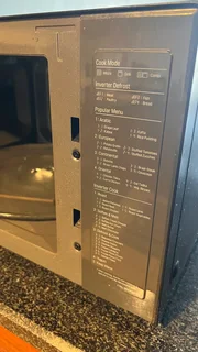 ⚡ LG 42L Black Mirror Microwave with Grill – Model MH8265DIS (Smart Inverter Series)Condition: Used