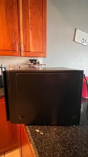 ⚡ LG 42L Black Mirror Microwave with Grill – Model MH8265DIS (Smart Inverter Series)Condition: Used