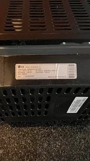 ⚡ LG 42L Black Mirror Microwave with Grill – Model MH8265DIS (Smart Inverter Series)Condition: Used