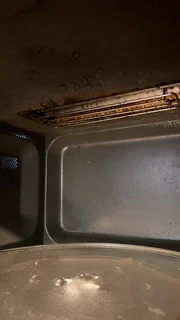 ⚡ LG 42L Black Mirror Microwave with Grill – Model MH8265DIS (Smart Inverter Series)Condition: Used