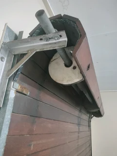 1x Timbercon meranti wooden rollup garage door  R4000.