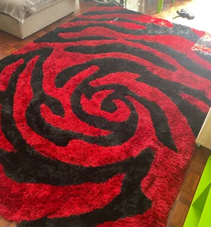 Red and Black abstract shaggy rug.
