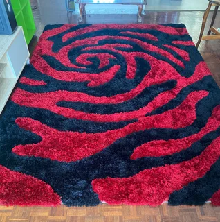 Red and Black abstract shaggy rug.