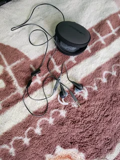 Gray and black bose  wired  earphones