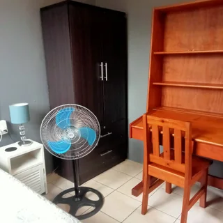 Private, secure, fully furnished outside room in Durban Nth to let to working woman or student R3900