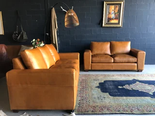 Immaculate 2pc CHOBE STYLE genuine leather lounge suite. (2.2m THREE SEATER plus 1.8m TWO SEATER)