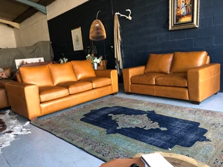 Immaculate 2pc CHOBE STYLE genuine leather lounge suite. (2.2m THREE SEATER plus 1.8m TWO SEATER)
