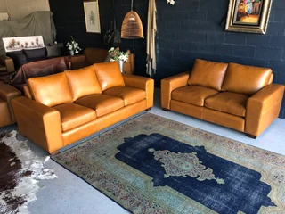 Immaculate 2pc CHOBE STYLE genuine leather lounge suite. (2.2m THREE SEATER plus 1.8m TWO SEATER)