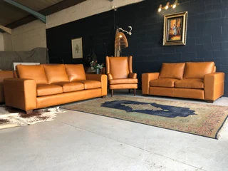 Immaculate 3pc  genuine Leather Lounge Suite. (3 & 2 Seater Sofas Plus 1 X Wingback Armchair)