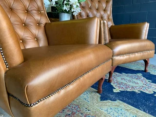 2 x Occasional genuine leather DESIGNER WINGBACK ARMCHIARS plus 2 x footstool ottomans.  R13500 each