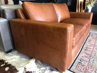 Immaculate 2m full grain gameskin genuine leather CONTEMPORARY DESIGN two seater sofa, Brand new.