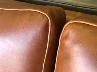 Immaculate 2m full grain gameskin genuine leather CONTEMPORARY DESIGN two seater sofa, Brand new.