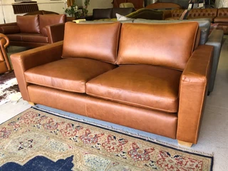 Immaculate 2m full grain gameskin genuine leather CONTEMPORARY DESIGN two seater sofa, Brand new.