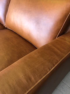 Immaculate 2m full grain gameskin genuine leather CONTEMPORARY DESIGN two seater sofa, Brand new.