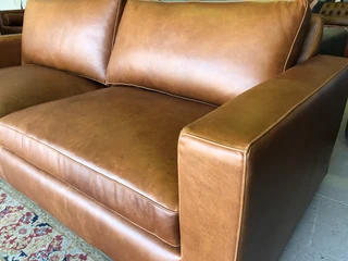 Immaculate 2m full grain gameskin genuine leather CONTEMPORARY DESIGN two seater sofa, Brand new.