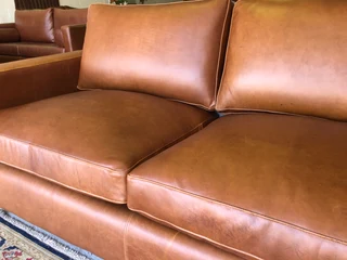 Immaculate 2m full grain gameskin genuine leather CONTEMPORARY DESIGN two seater sofa, Brand new.