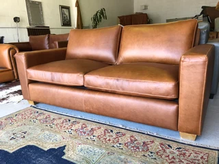 Immaculate 2m full grain gameskin genuine leather CONTEMPORARY DESIGN two seater sofa, Brand new.