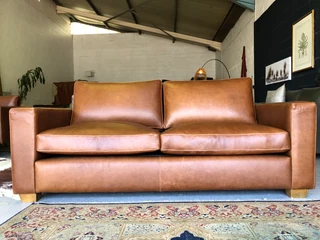 Immaculate 2m full grain gameskin genuine leather CONTEMPORARY DESIGN two seater sofa, Brand new.