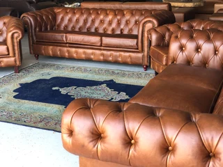 A Magnificent 4 piece genuine leather CHESTERFIELD lounge suite. (NEWLY MANUFACTURED EXCLUSIVELY)