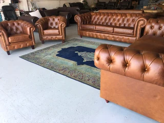 A Magnificent 4 piece genuine leather CHESTERFIELD lounge suite. (NEWLY MANUFACTURED EXCLUSIVELY)