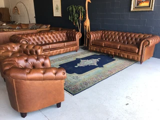 A Magnificent 4 piece genuine leather CHESTERFIELD lounge suite. (NEWLY MANUFACTURED EXCLUSIVELY)